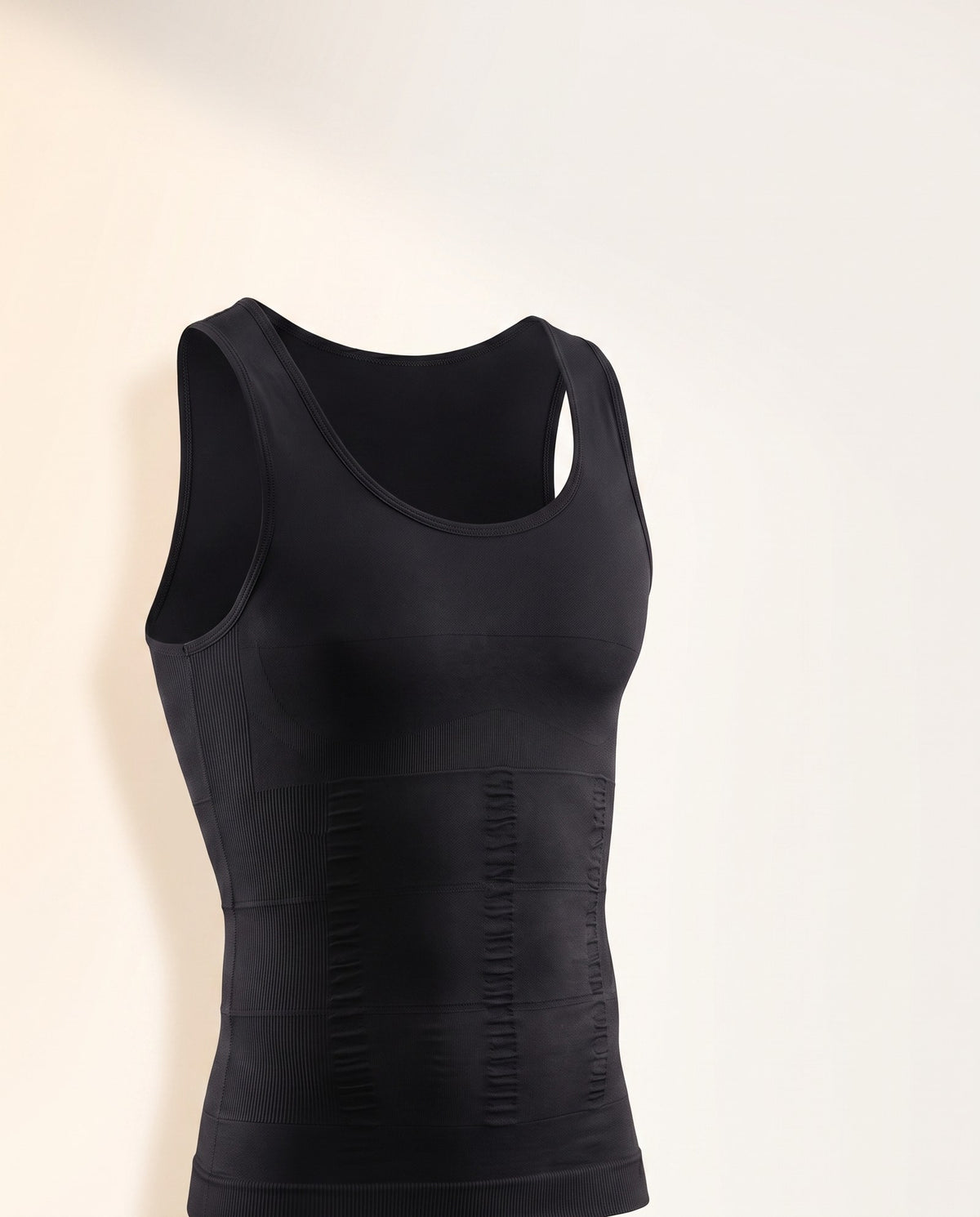 The Rightcut compression tank on a warm off-white studio background